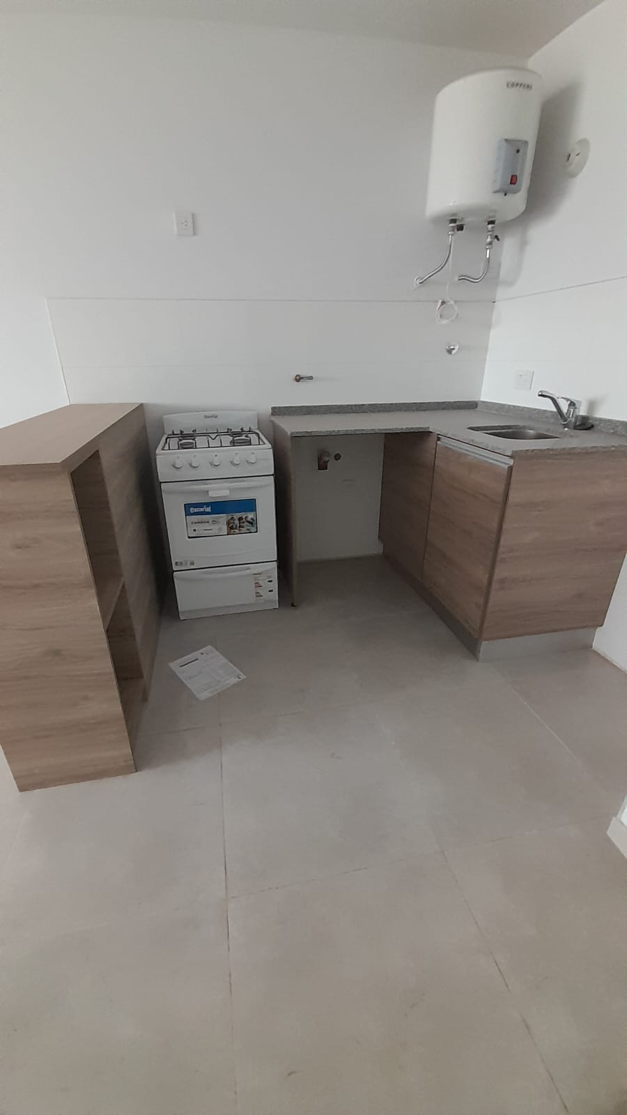 1 dormitorio (con Placard) · baño · cocina integrada al estar comedor · balcón · 5to piso vista al frente · cochera · escritura - foto 2