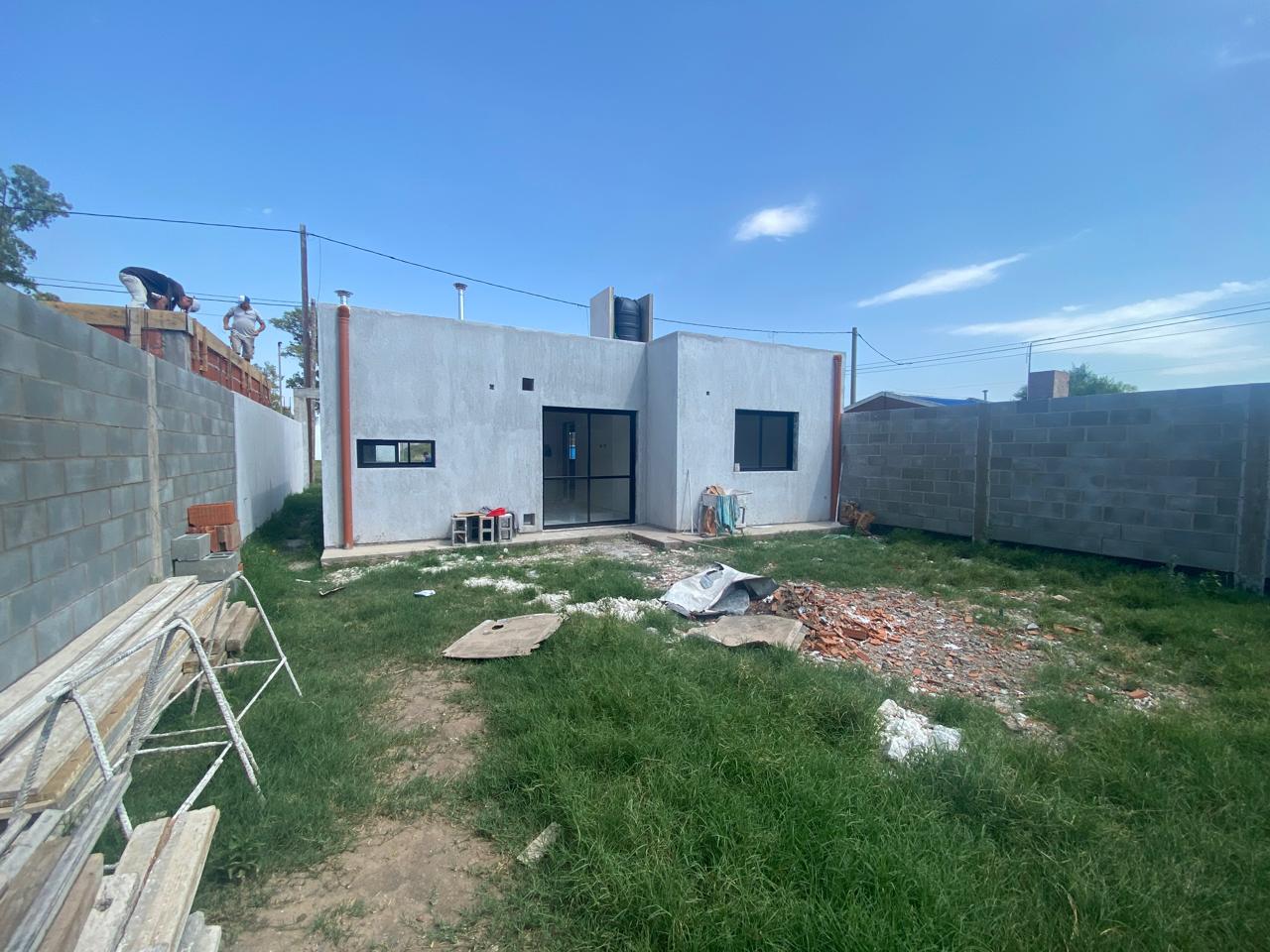 Casa a estrenar · 2 dormitorios · baño · cocina integrada al estar comedor · patio · espacio para cochera doble · escritura · lote 10x20 · superf.cubierta 63m2 - foto 6